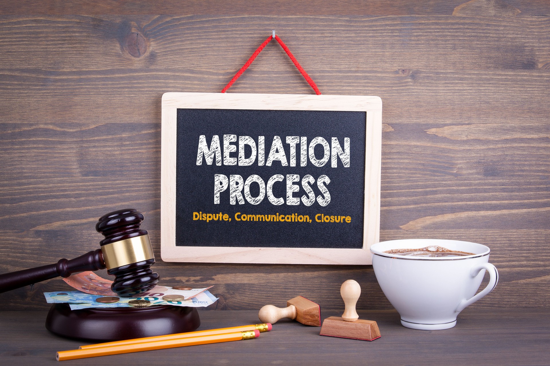 Mediation Process concept. Dispute Communication Closure. Chalkboard on a wooden background